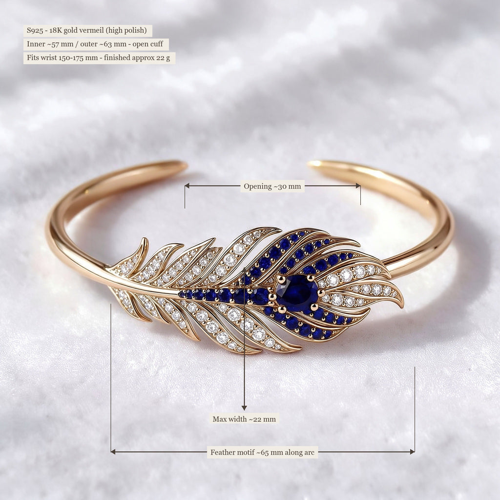 The Plume Cuff — 18K Gold Vermeil Feather Bangle with Royal Blue Lab Sapphire