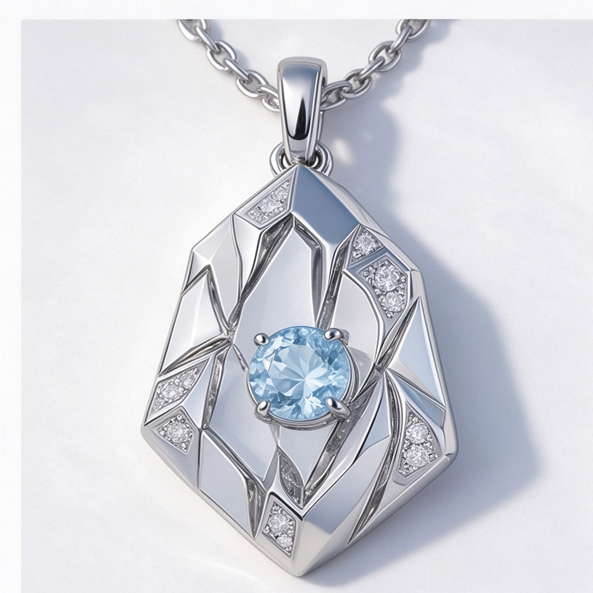 The Glacier Pendant in high-polish rhodium-finished 18K white gold sterling silver, a faceted ice-form pendant with a pale ice-blue round moissanite at its heart, front view