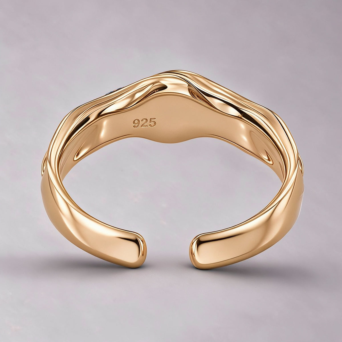 The Nereid Cuff from the inner side, a polished plane with a recessed 925 hallmark and rounded terminals