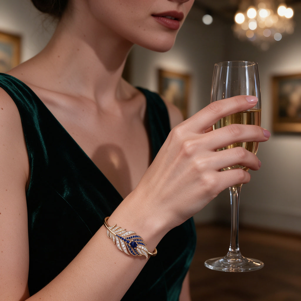 The Plume Cuff — 18K Gold Vermeil Feather Bangle with Royal Blue Lab Sapphire